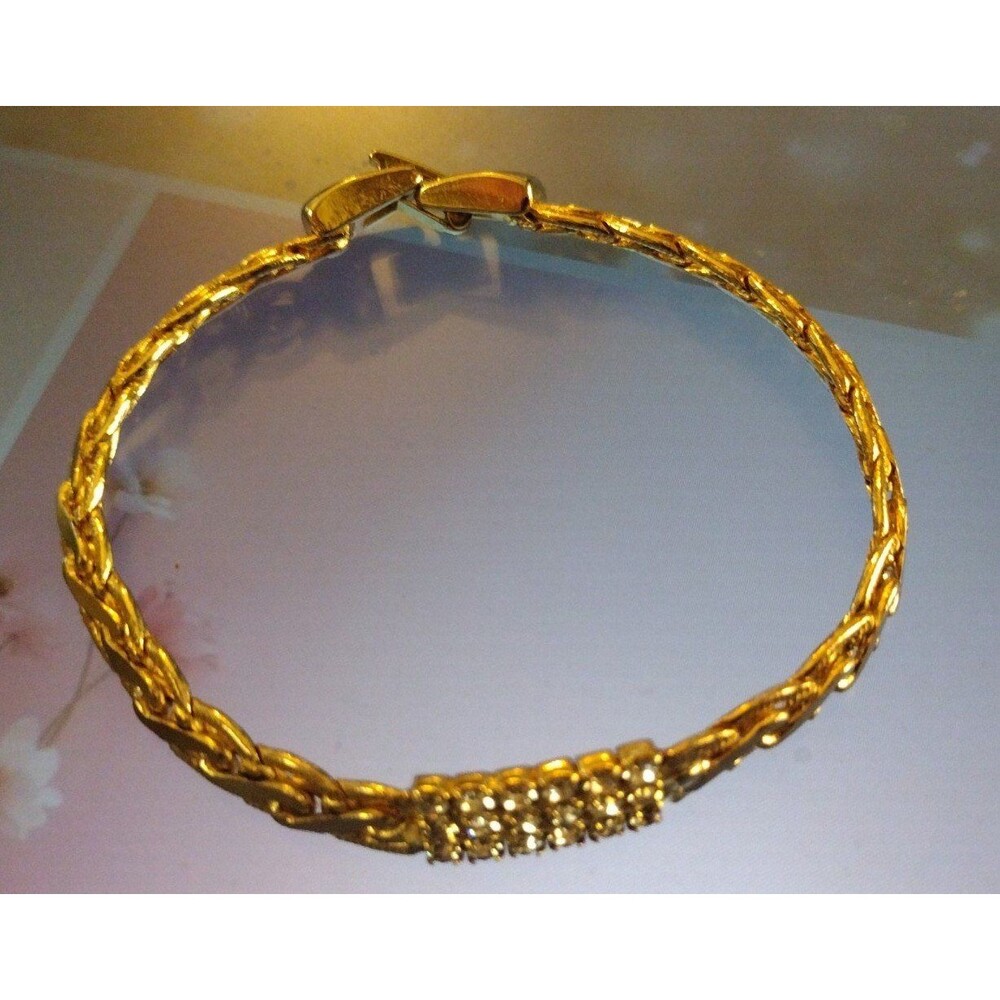 Goldtone braided crystal accents bracelet
